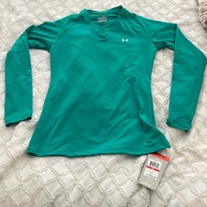 Teal colored underarmor loose fit XS athletic top. Heat gear